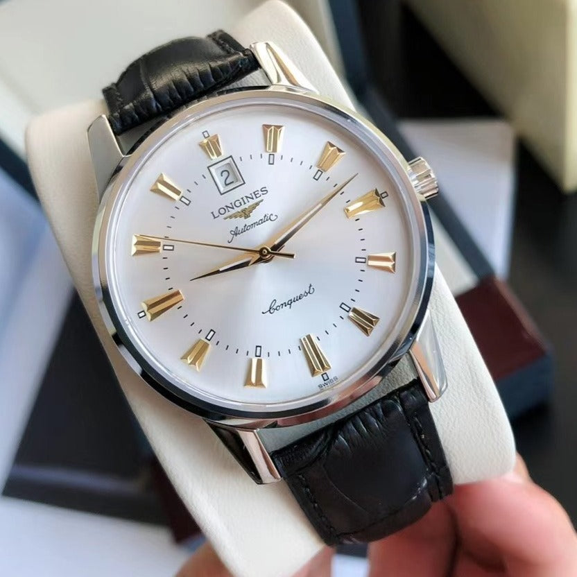 CONQUEST STEEL CASE WHITE DIAL GOLD NUMERAL