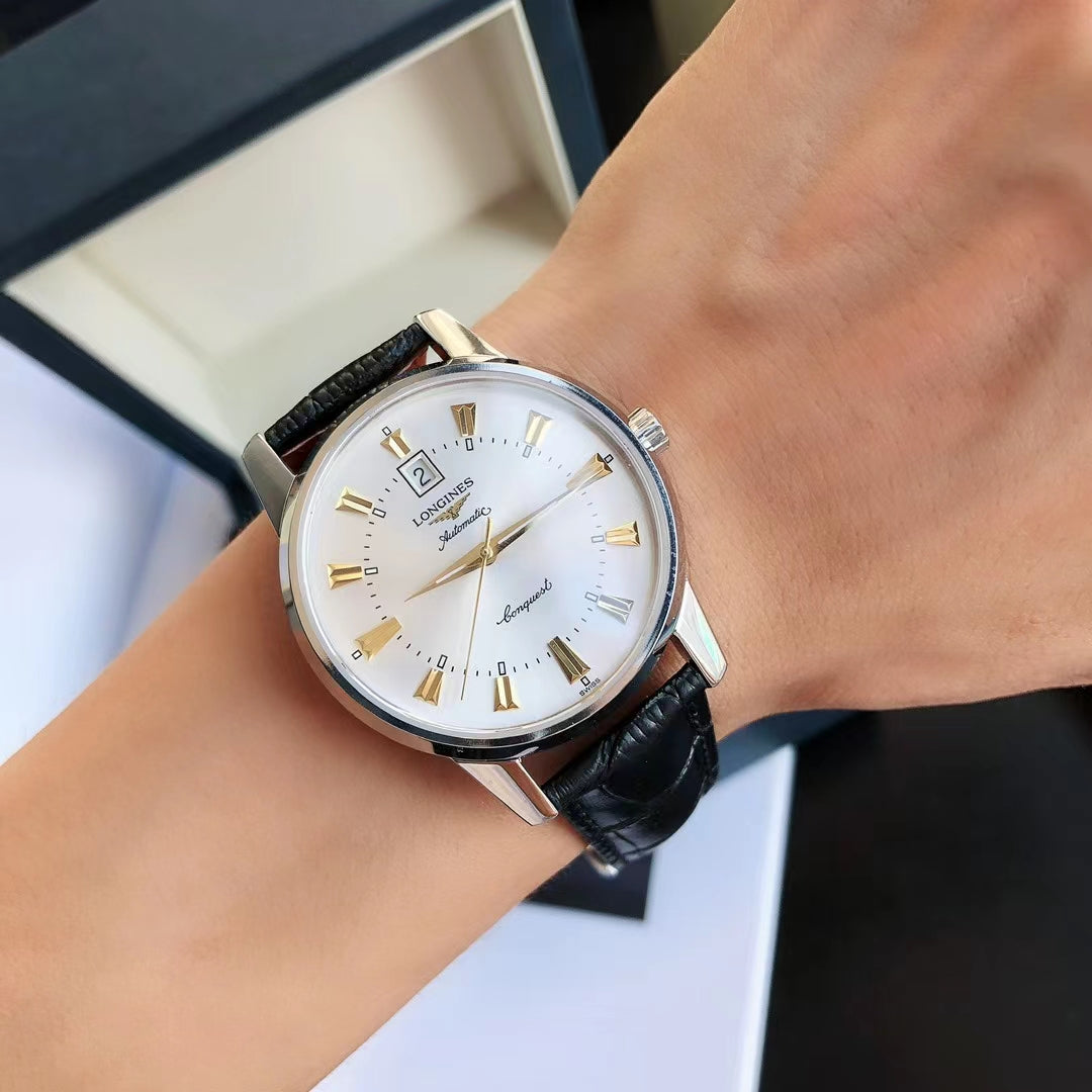 CONQUEST STEEL CASE WHITE DIAL GOLD NUMERAL
