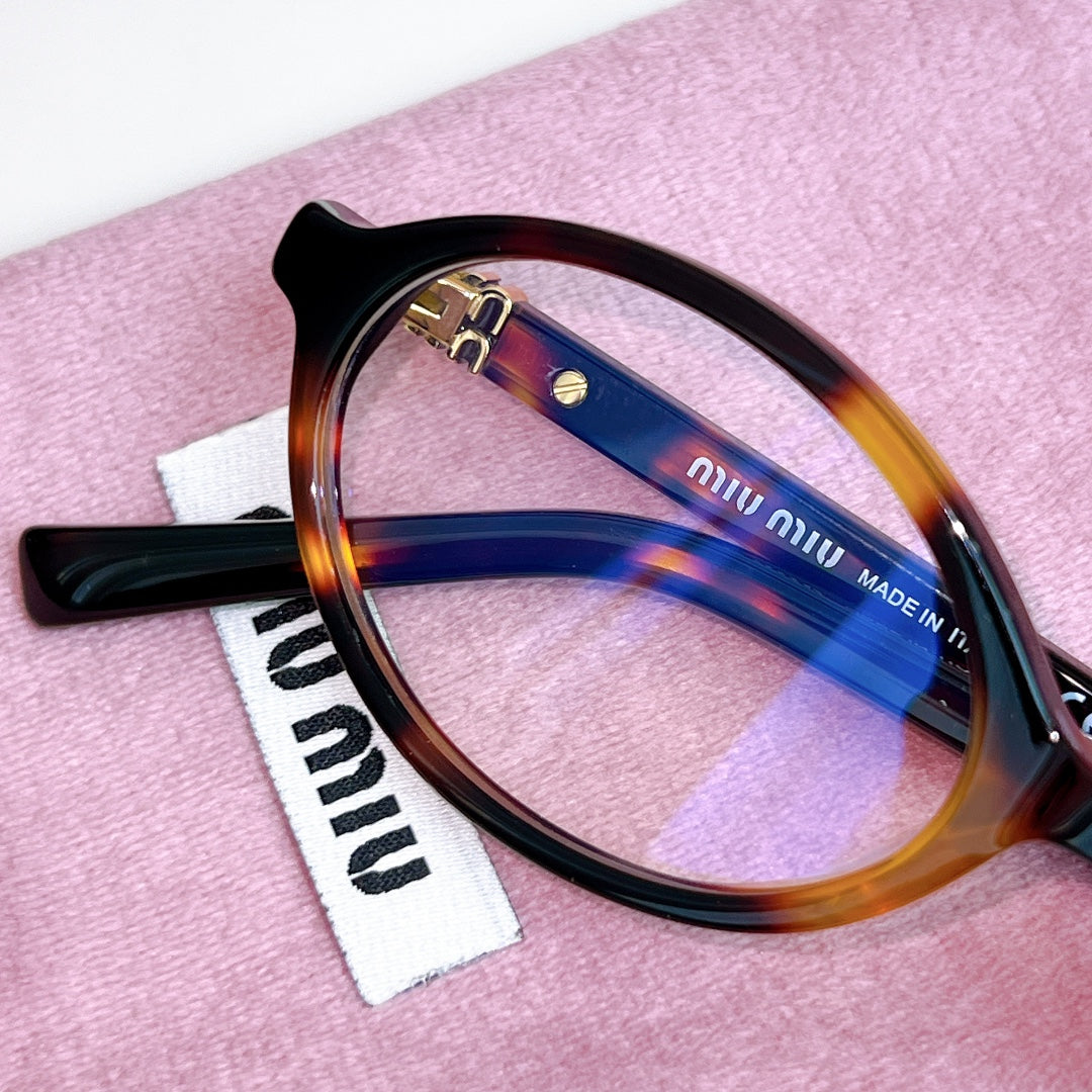 Miumiu Sunglasses SMU04Z