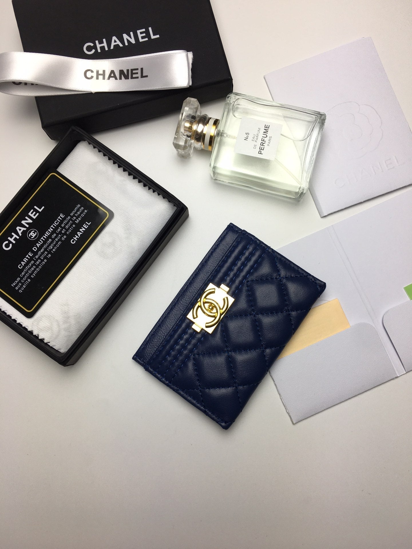 CC BOY CARD HOLDER 11.2 NAVY CALFSKIN GOLD ICON