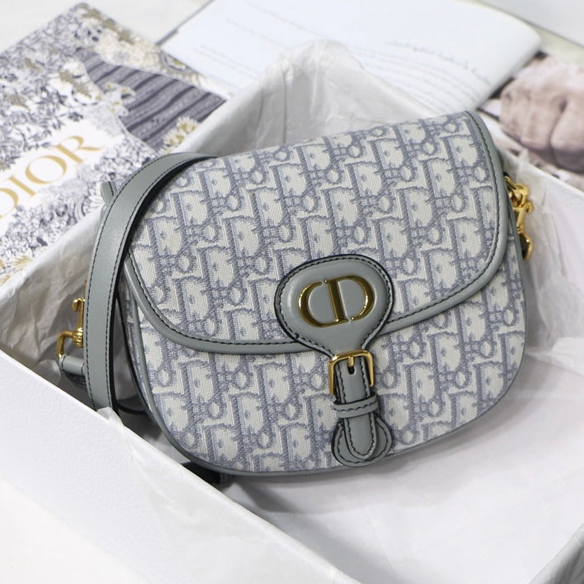 MEDIUM CD BOBBY 22CM GREY OBLIQUE CANVAS GOLD HARDWARE