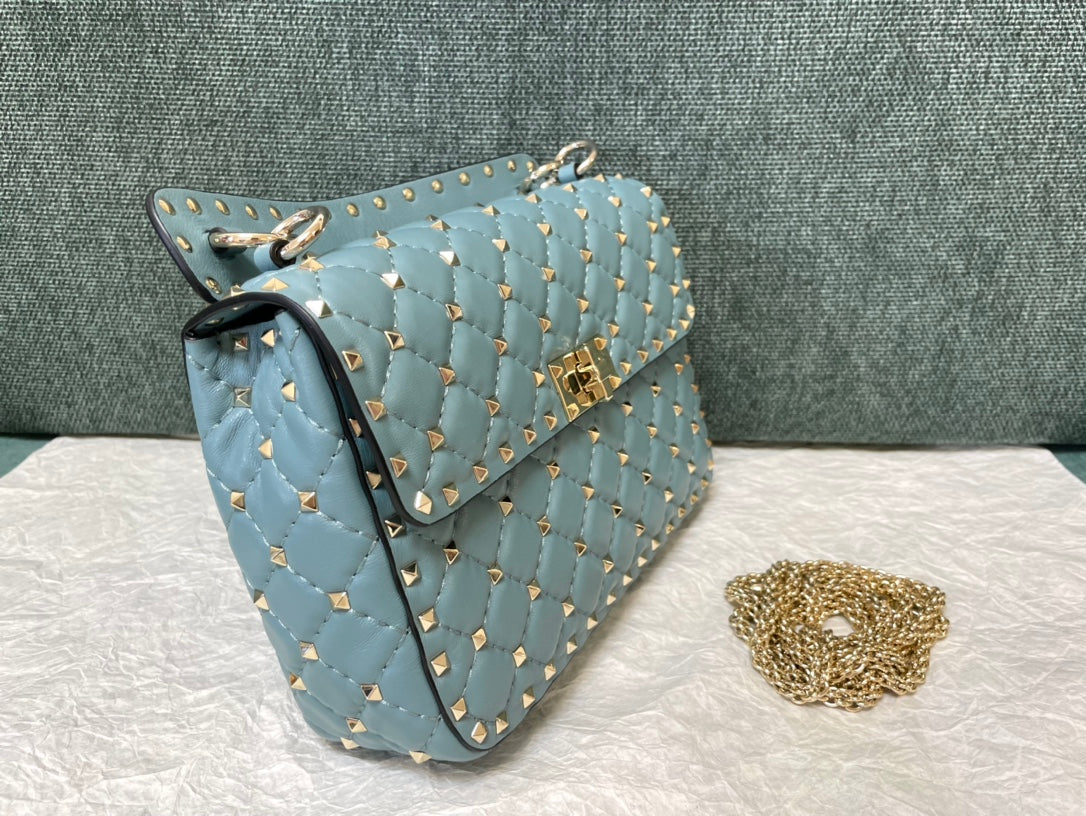 garavani rockstud spike medium 24cm azure lambskin