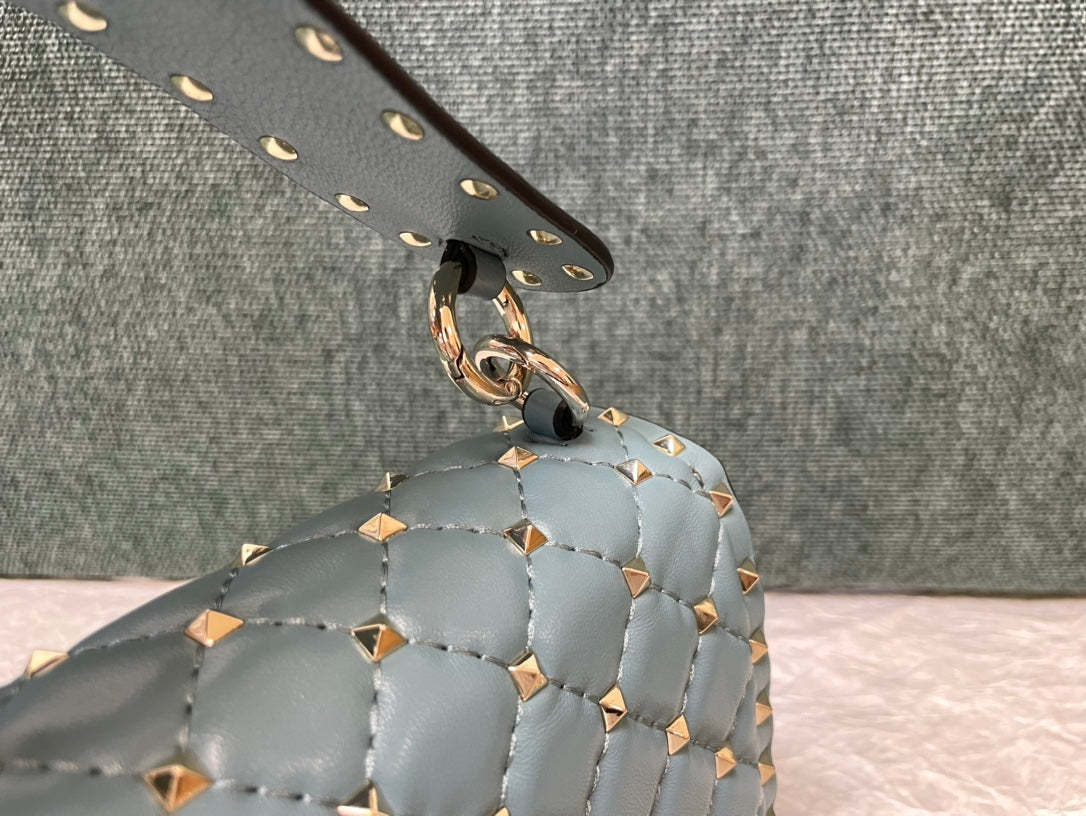 garavani rockstud spike medium 24cm azure lambskin