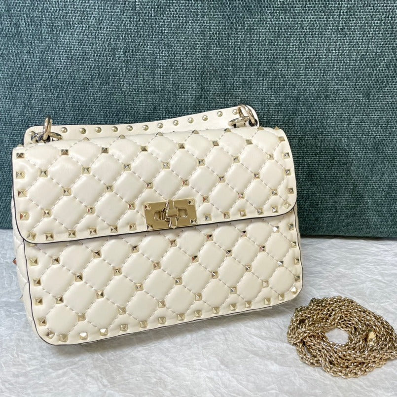 garavani rockstud spike medium 24cm white lambskin