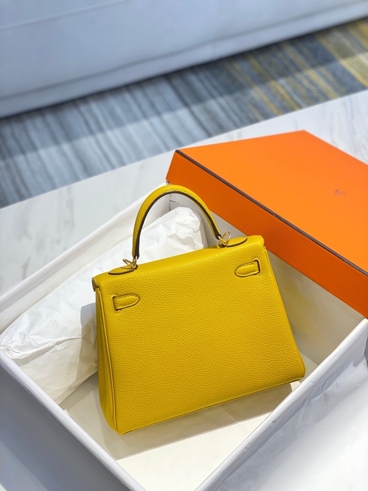 HM KELLY 25CM YELLOW TOGO GOLD HARDWARE