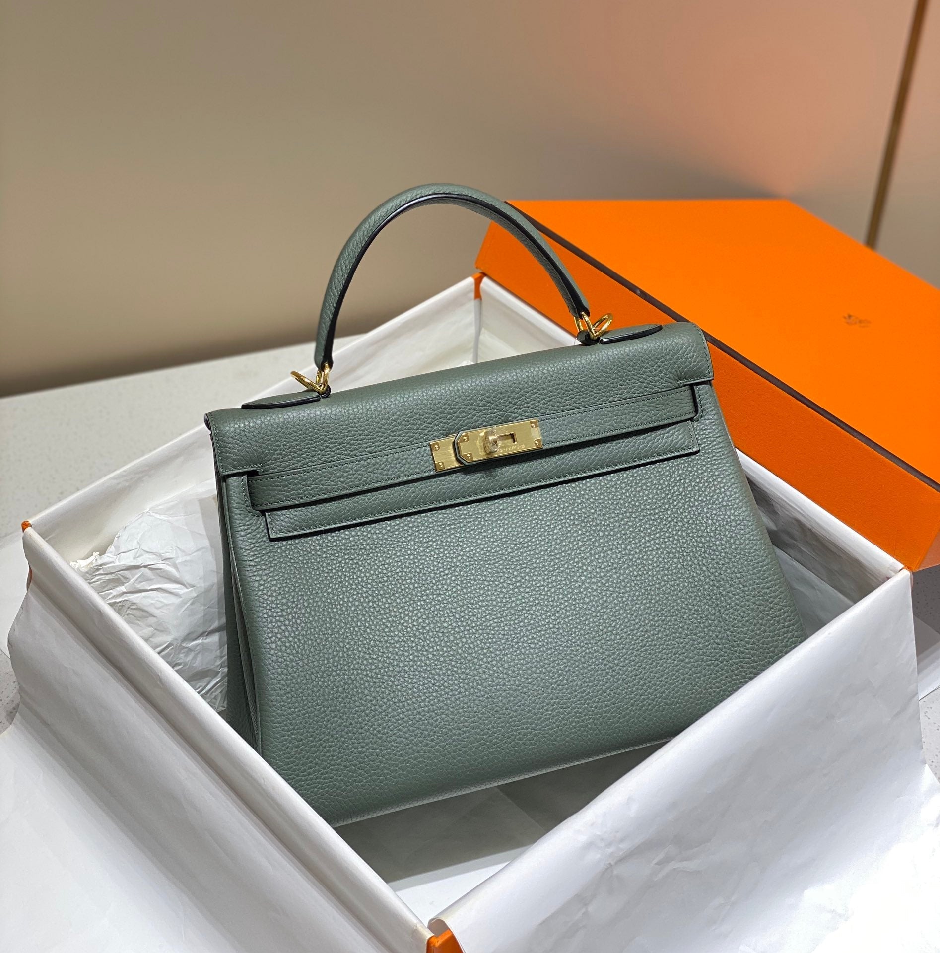 hm kelly 32cm togo leather gold hardware