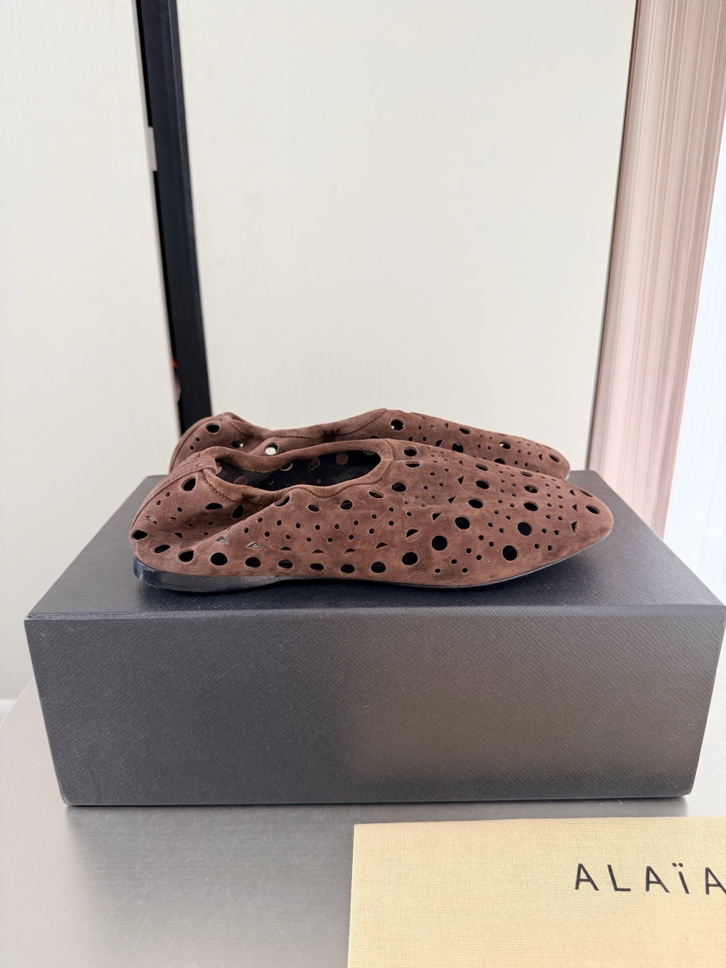 Alaia 2026 Ballerina Flats Perforated Suede 784611