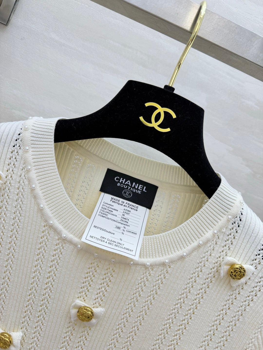 Chanel 2026 Gold Button Bow Short-sleeve Top Cream Cotton 394202
