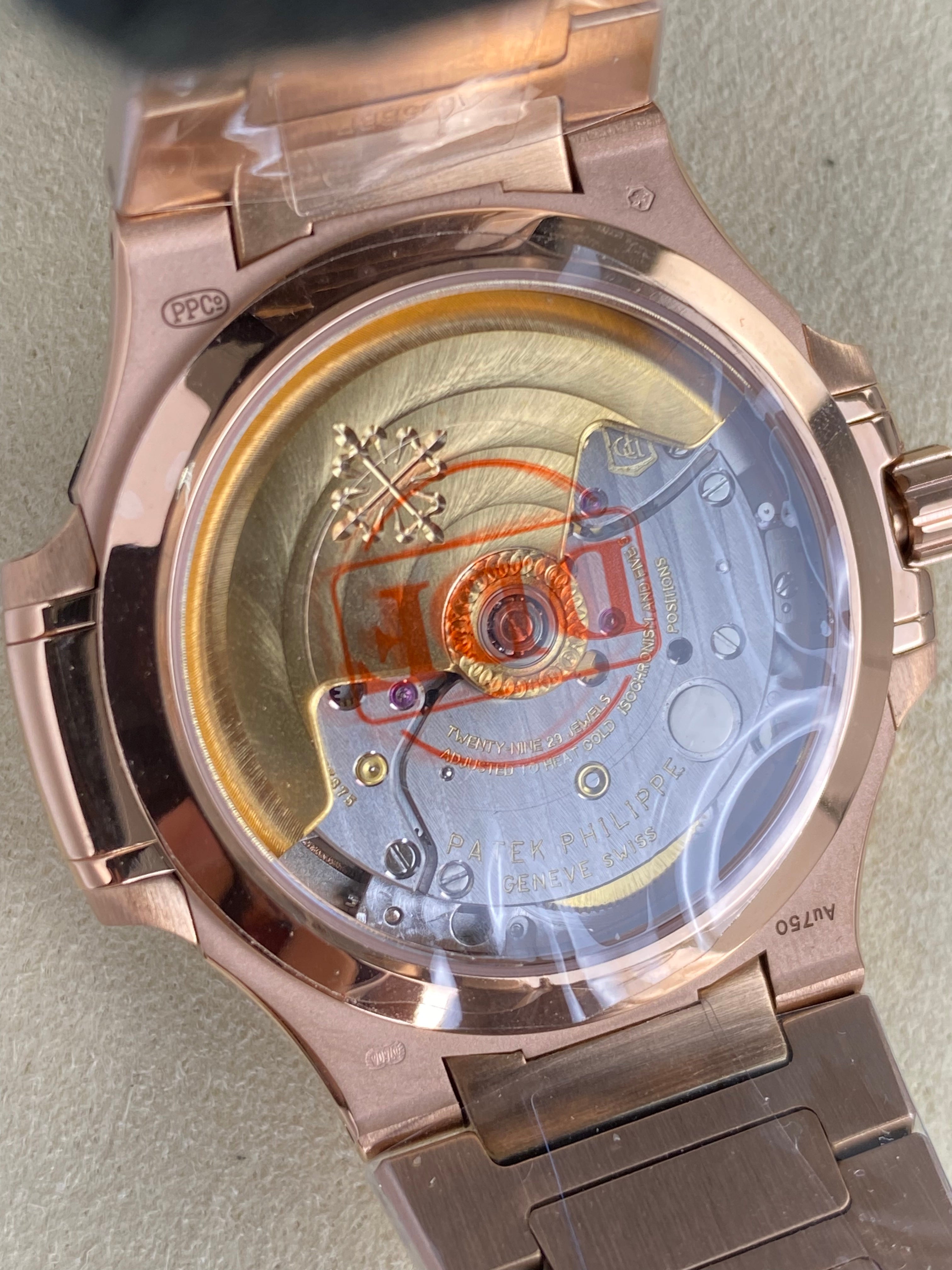 Patek Philippe Nautilus 35.2mm Rose Gold Case White Dial