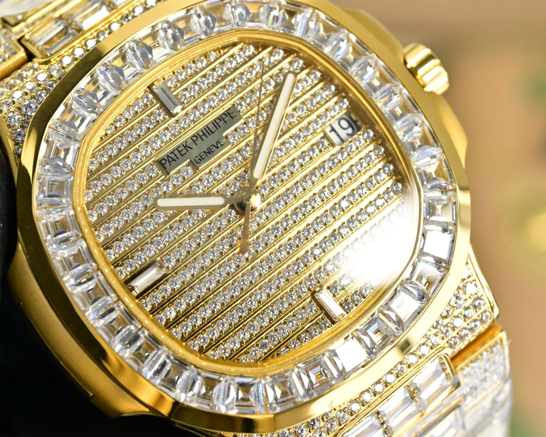 Patek Philippe Nautilus 40mm Yellow Gold Baguette Diamonds Watch
