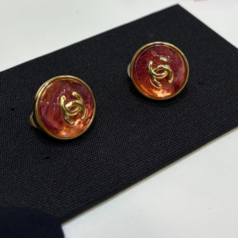Chanel Gripoix Earrings With Gold CC Logo And Red Glass Stones