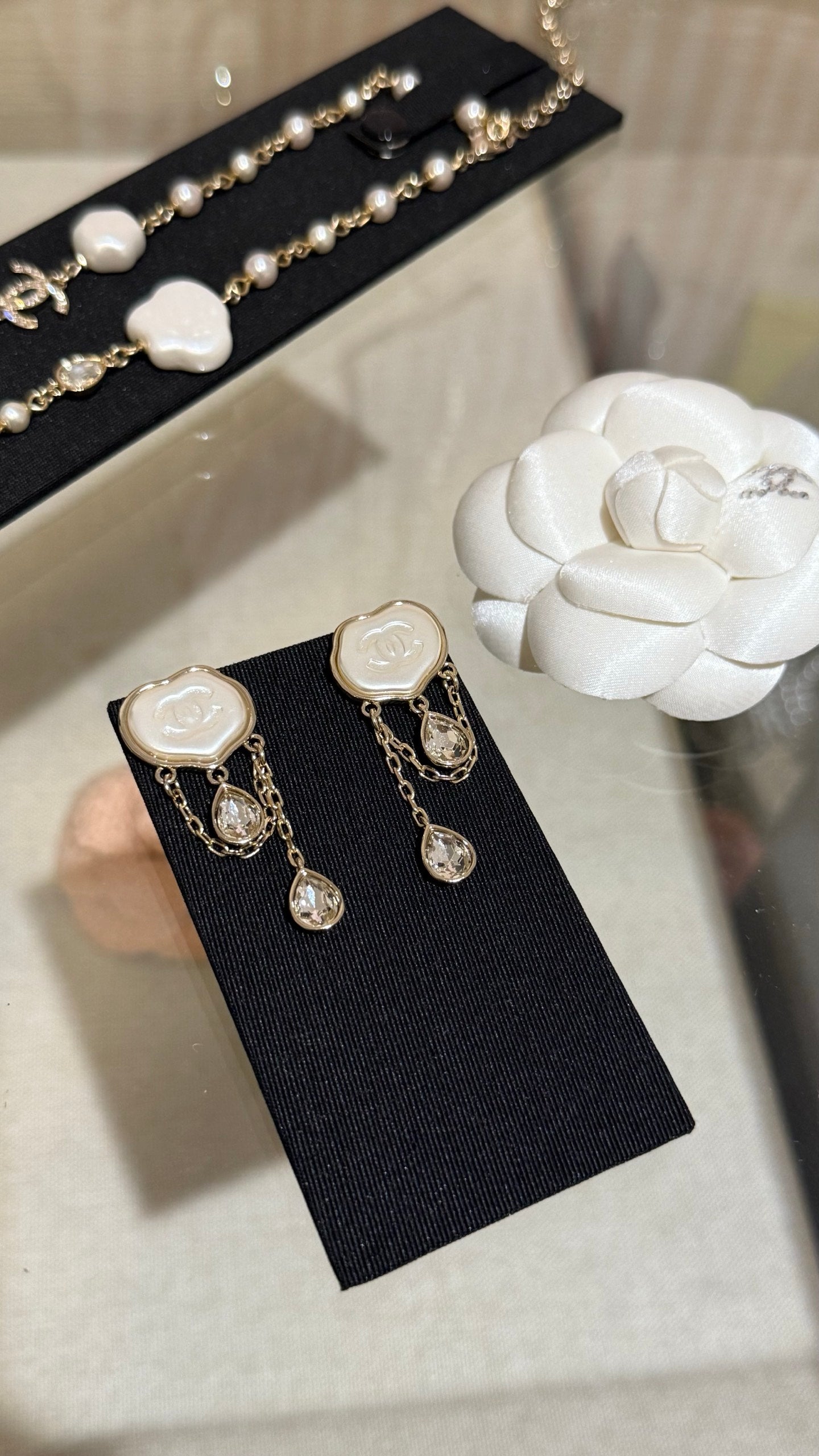 Chanel  Cloud Double C Resin Double Teardrop Crystal Light Gold Chain Tassel Earrings