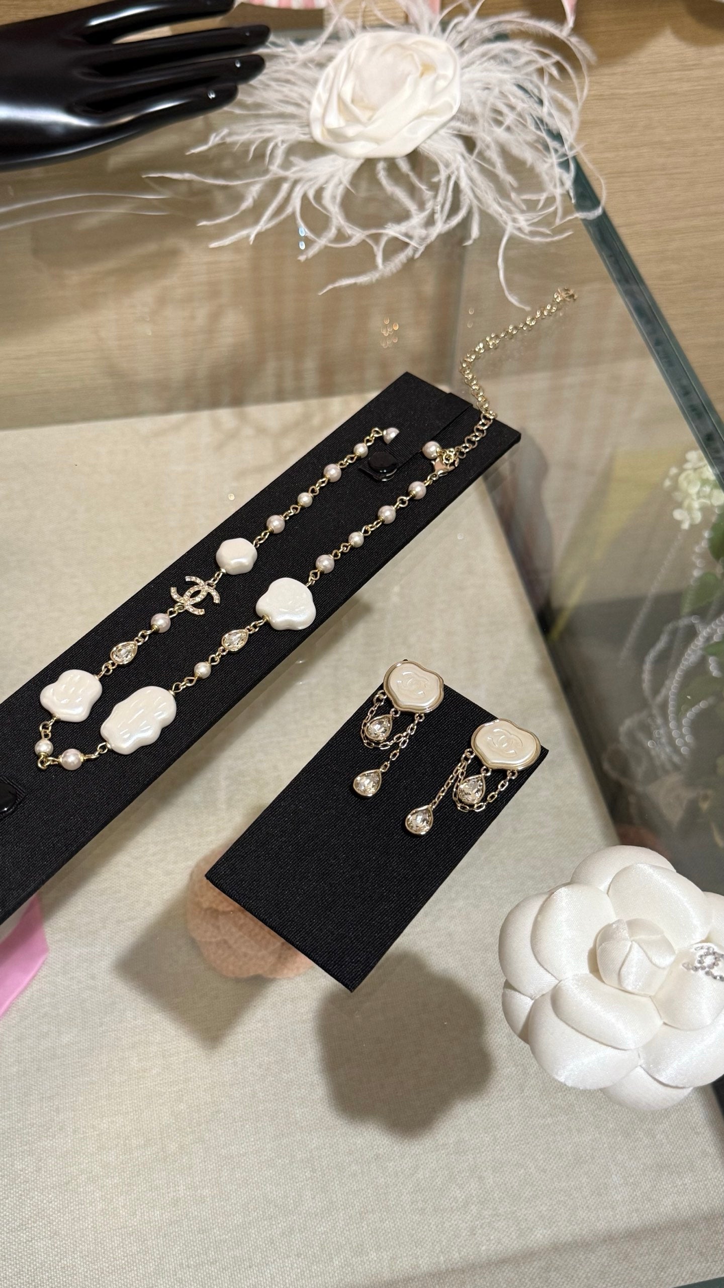 Chanel  Cloud Double C Resin Double Teardrop Crystal Light Gold Chain Tassel Earrings