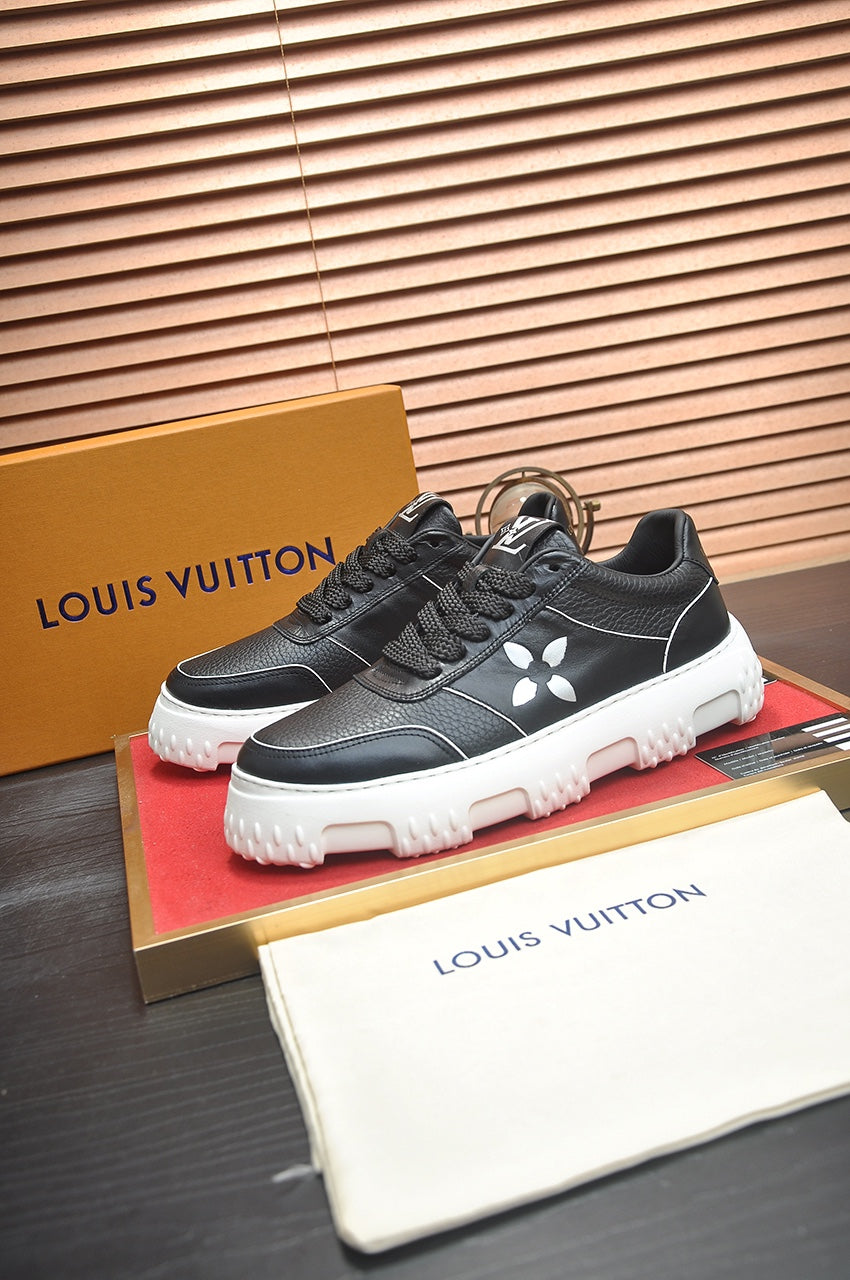 LV TRAINER BLACK MONOGRAM CALFSKIN