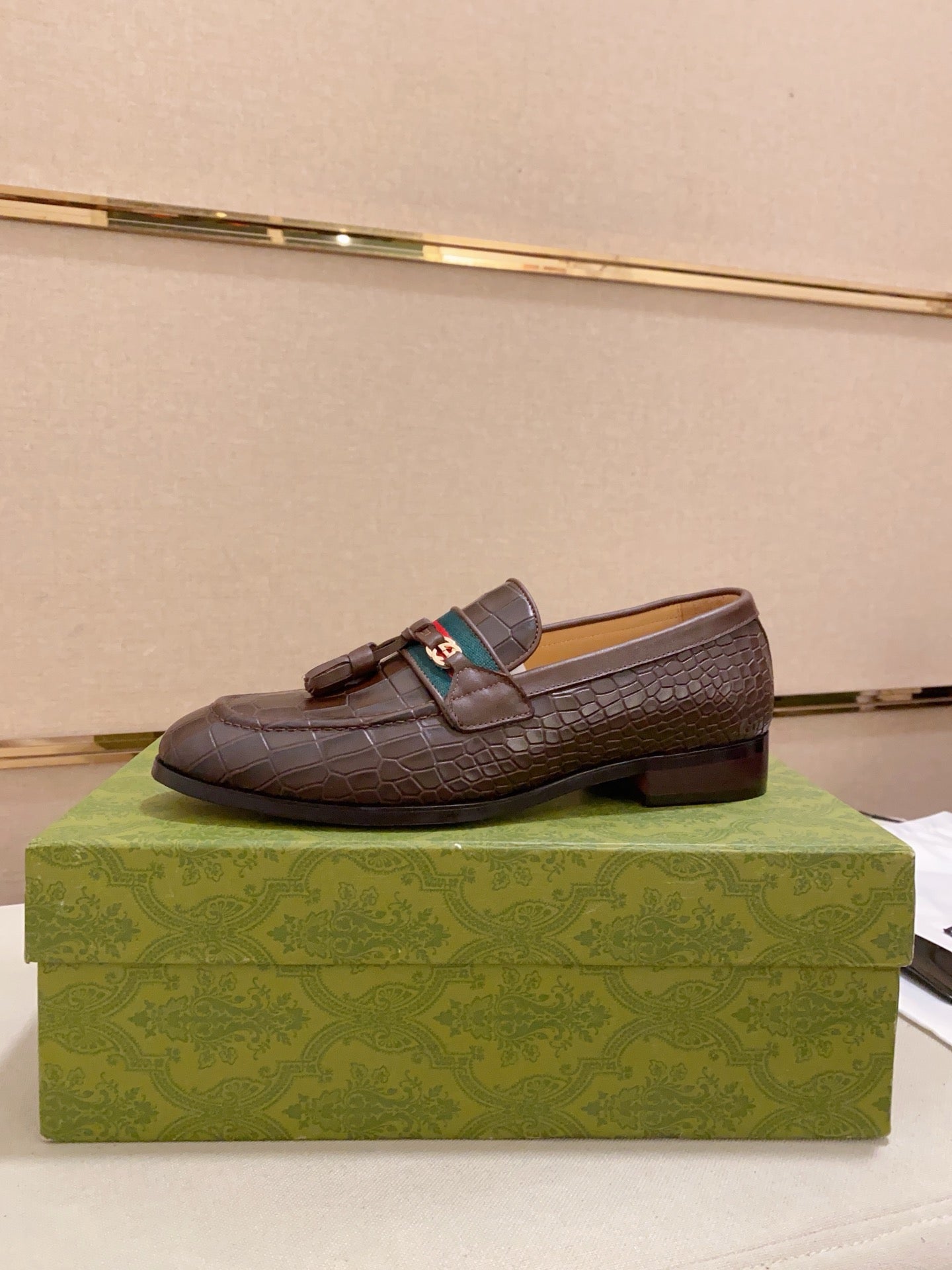 GG Men's Tassel Loafer Brown Embossed Cowhide 573362