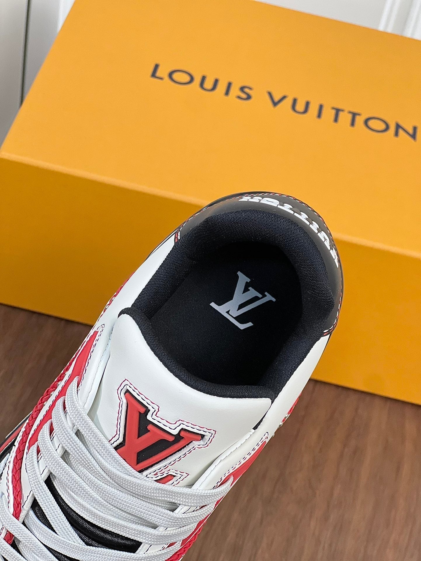 LV TRAINER WHITE MIX BLACK AND RED MONOGRAM CALFSKIN