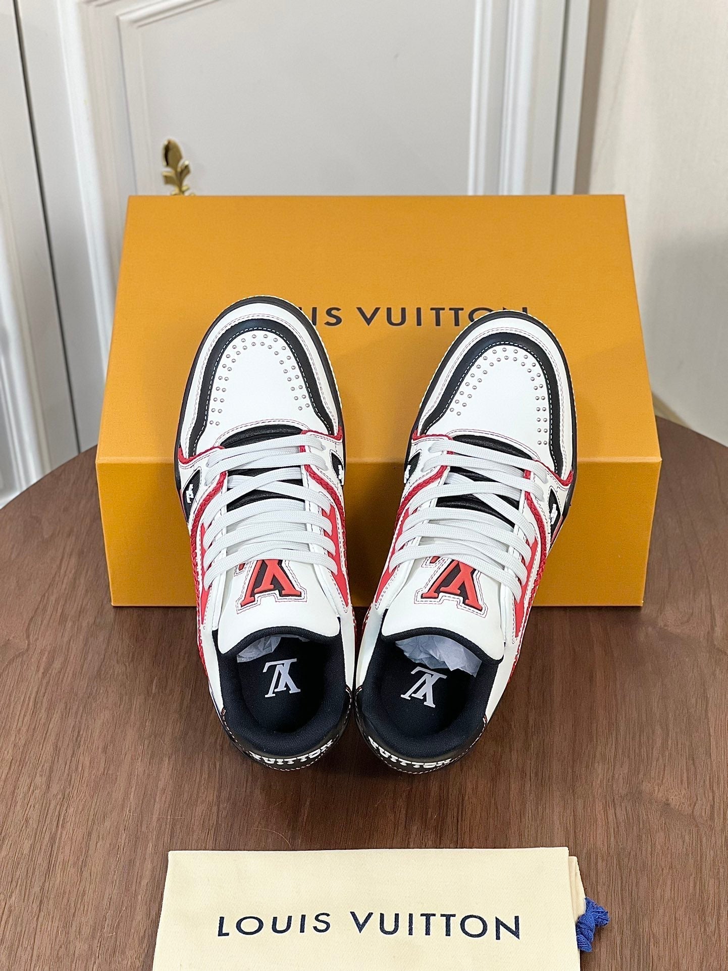 LV TRAINER WHITE MIX BLACK AND RED MONOGRAM CALFSKIN