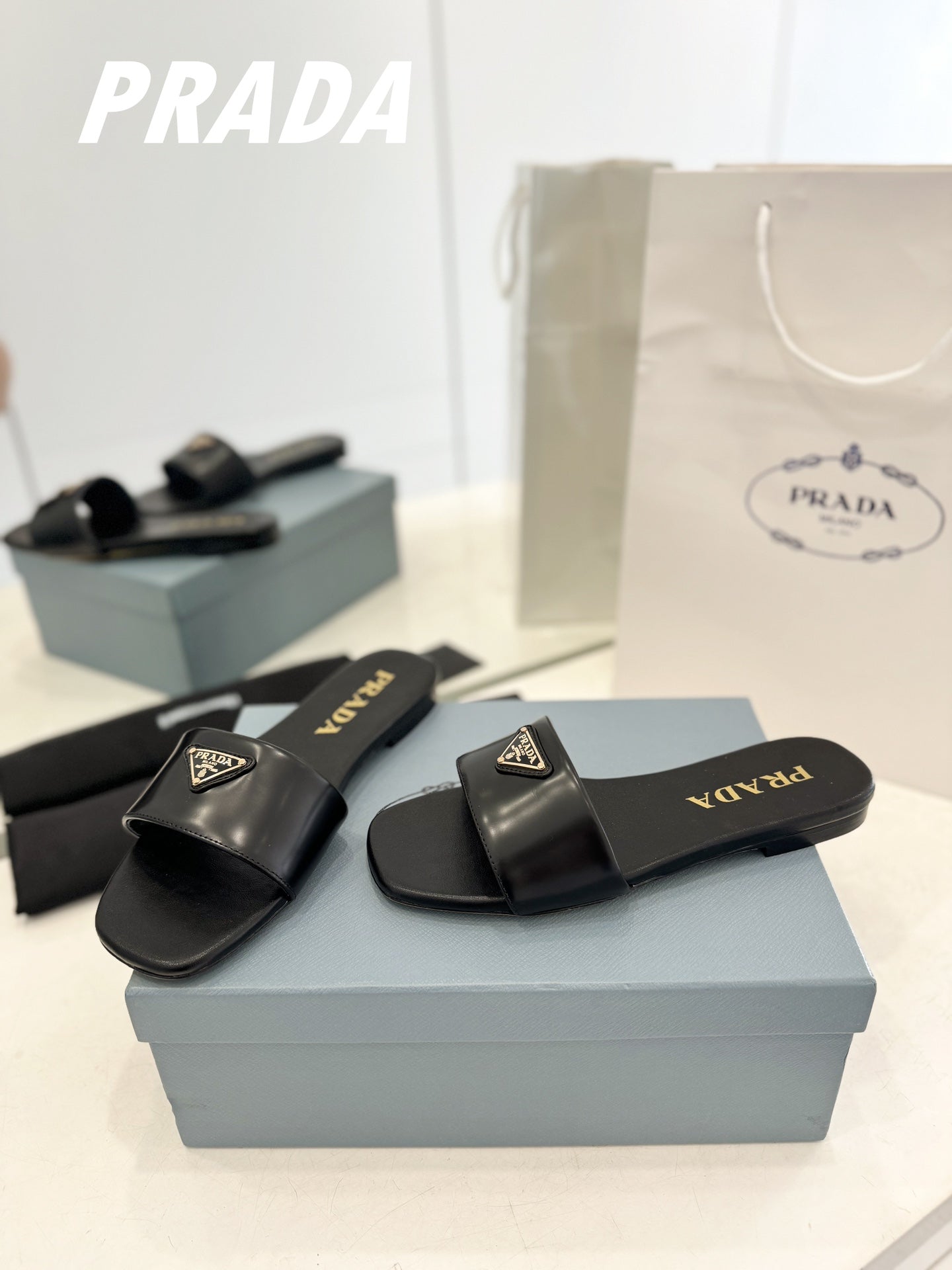 Prada 2026 Silde Sandal Black Cowhide 664761