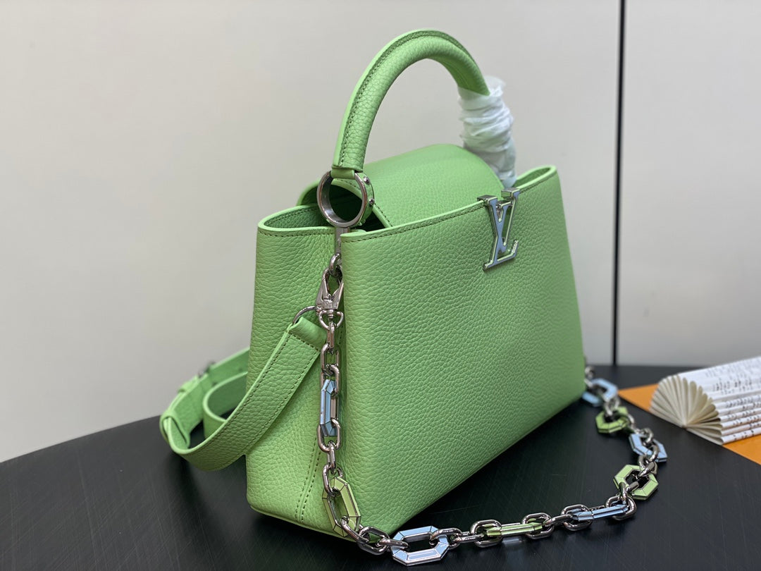 capucines mm 31.5 green taurillon leather turquoise silver hardware