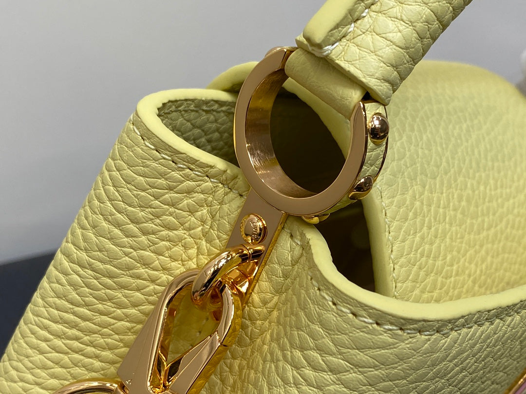 CAPUCINES MINI 21 YELLOW TAURILLON GOLD HARDWARE