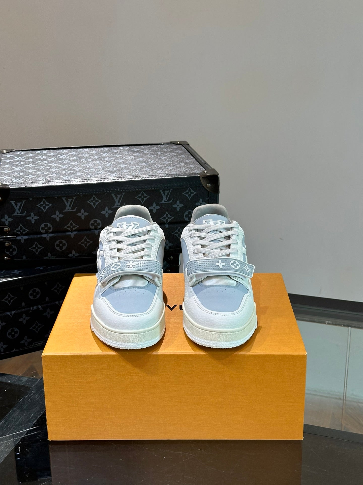 LV TRAINER SNEAKERS IN WHITE CALFSKIN AND LIGHT BLUE SUEDE