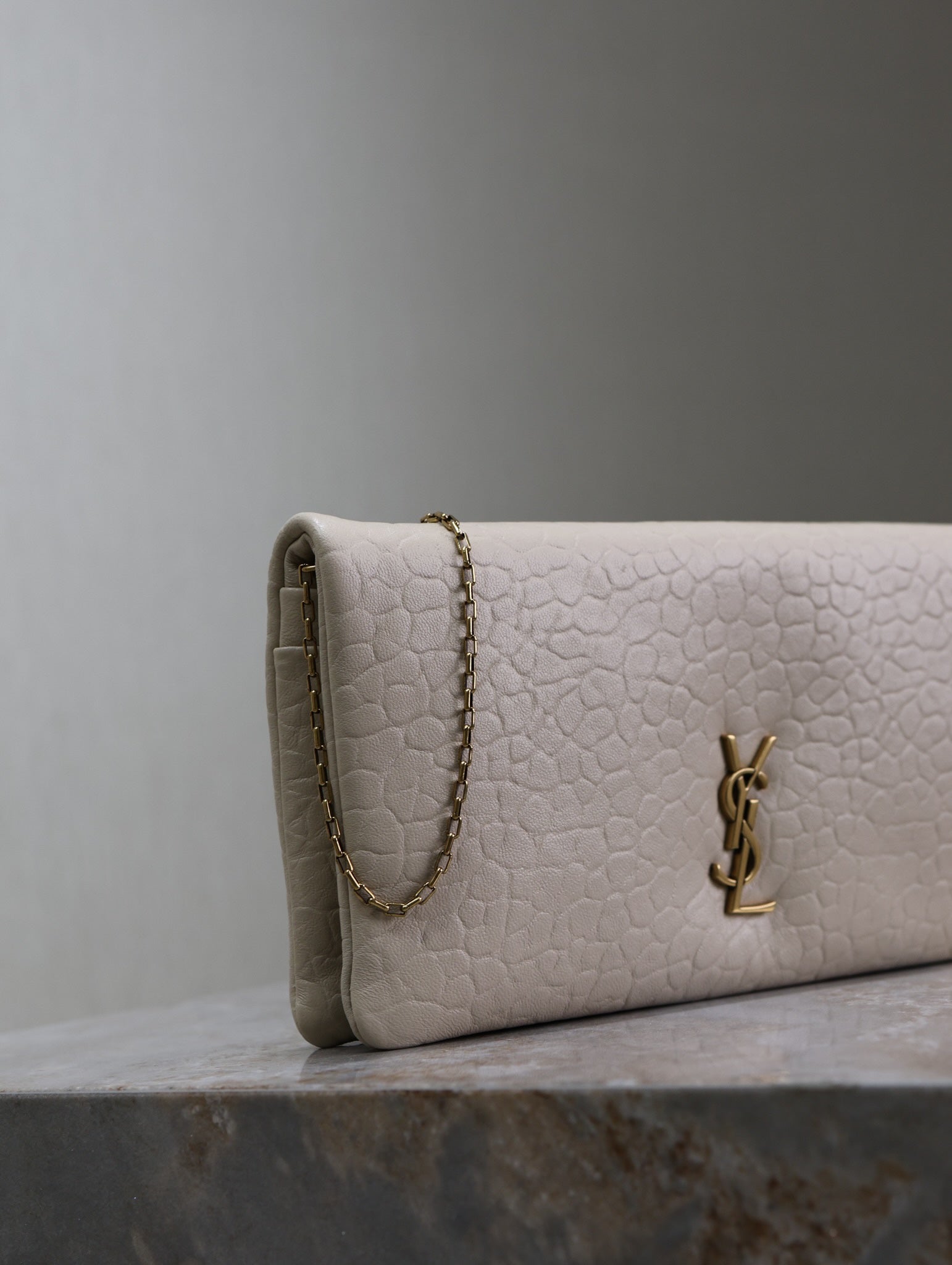 CALYPSO POUCH 24 IN CREAM ELEPHANT TEXTURED LAMBSKIN GOLD LOGO